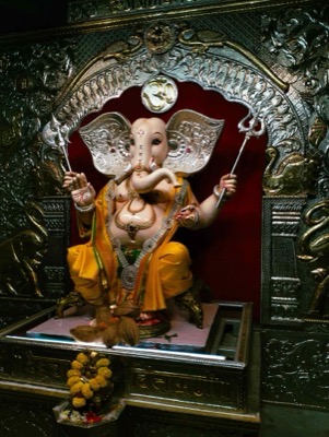 Marble Ganesha idol with garlands