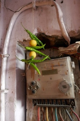 Lemon and green chillies strung together against the evil eye